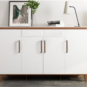 In-use view of walnut wood bar cabinet pull with silver-colored mounts, style #5 (128 mm).