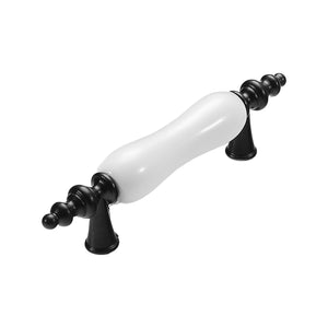 Black bar pull with a white ceramic center and turned end finials, option No. 5, 76 mm.