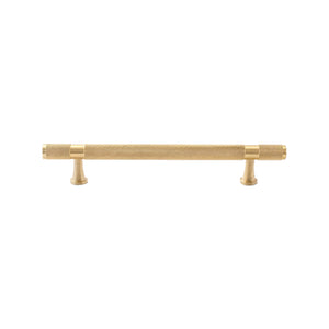 Brass-tone bar pull with a knurled body and flared mounting feet, 128 mm, option No. 9.