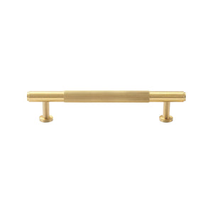 Brass-tone bar pull with a ribbed central grip and smooth ends, 128 mm, option No. 7.