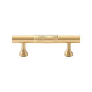 Brass-tone bar pull with a ring-ribbed center and stepped feet, 64 mm, option No. 10.