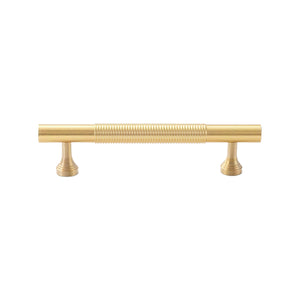 Brass-tone bar pull with a ring-ribbed center and stepped feet, 96 mm, option No. 10.