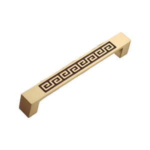 Brass-tone straight bar pull with a Greek key pattern, 128 mm, option No. 3.