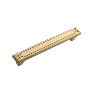 Brass-tone straight bar pull with inset lines and square end motifs, 128 mm, option No. 2.