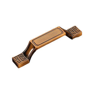 Bronze-tone angled bar pull with a rectangular center and Greek key square ends, option No. 24, 96 mm.