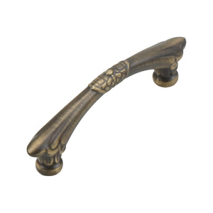 Bronze-tone curved bar pull with a patterned center band, option No. 4, 86 mm.