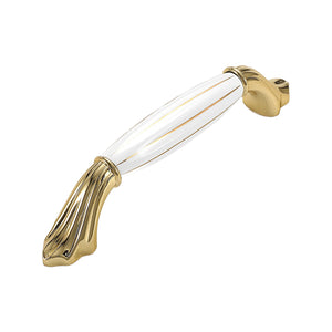 Gold-tone bar pull with a ribbed white ceramic grip and flared ends, option No. 9, 128 mm.