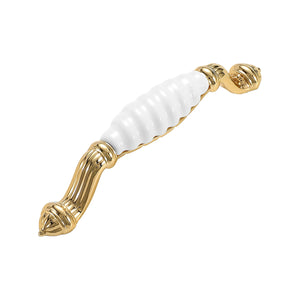 Gold-tone bar pull with a ribbed white ceramic grip and ornate ends, option No. 3, 128 mm.