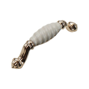 Gold-tone bar pull with a ribbed white ceramic grip, option No. 4, 114 mm.