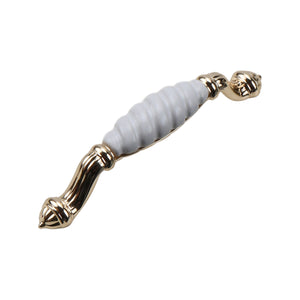 Gold-tone bar pull with a ribbed white ceramic grip, option No. 4, 153 mm.