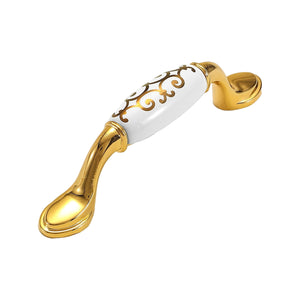 Bar pull with a white scroll-patterned grip and flared gold-tone ends, option #8, 96 mm.
