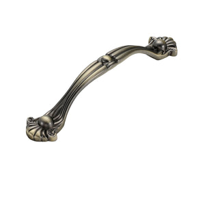 Arched bridge pull with a fluted grip and rounded ornamental ends, variant #20, 128 mm.