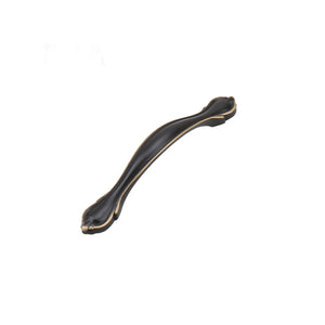 Black curved bridge pull with gold-tone leaf-shaped ends, option No. 3, 96 mm.