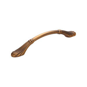 Bronze-tone curved bridge pull with fluted end plates, 128 mm.