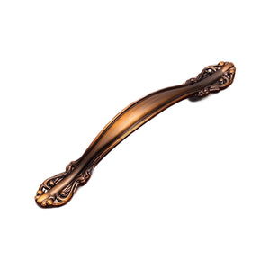 Bronze-tone curved bridge pull with ornate leaf-shaped ends, option No. 9, 96 mm.