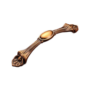 Bronze-tone bridge pull with an oval center and ornate flared ends, option No. 18, 96 mm.