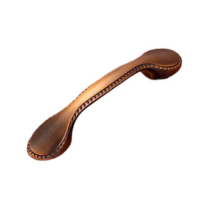 Brown curved bridge pull with dotted edge detail and wide oval ends, option No. 14, 96 mm.
