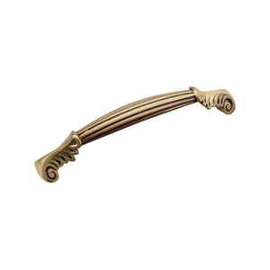 Rose gold-tone arched bridge pull with a fluted bar and scroll ends, 140 mm.