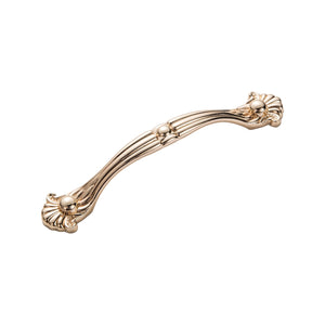 Rose gold-tone arched bridge pull with ornate floral ends, option No. 6, 128 mm.