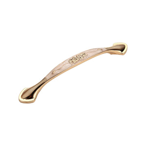 Rose gold-tone tapered bridge pull with a pale floral inlay, option No. 9, 128 mm.