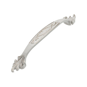 White arched bridge pull with vine engraving and fan-shaped ends, option No. 19, 128 mm.