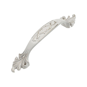 White arched bridge pull with vine engraving and fan-shaped ends, option No. 19, 96 mm.