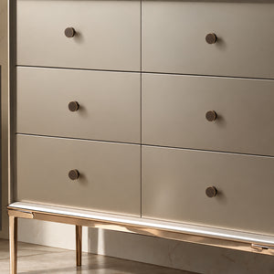 Bronze-finish solid brass round cabinet knob, style #1 (20 mm) shown in a styled setting.