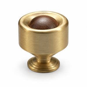 Brass cup cabinet knob with a dark wood ball inset, style #1.