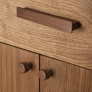 Round walnut wood cabinet knob, style #1 fitted to cabinetry.