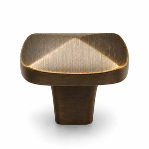 Softly squared antique bronze brass cabinet knob, style #17.