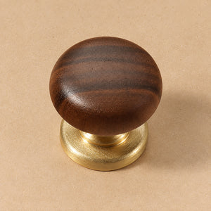 Side and mounting view of rounded dark wood cabinet knob on a brass pedestal, style #2.