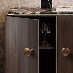 Bronze-finish solid brass round cabinet knob, style #3 (30 mm) shown in a styled setting.