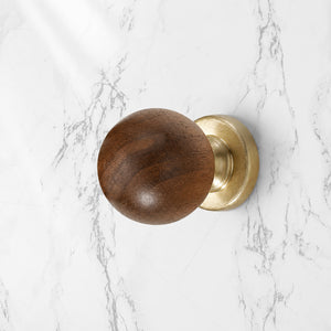 Side and mounting view of dark wood ball cabinet knob on a brass base, style #3 (30 mm).