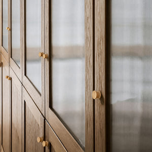 Round oak wood cabinet knob, style #3 fitted to cabinetry.