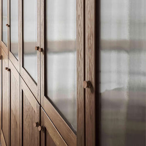 Round walnut wood cabinet knob, style #3 fitted to cabinetry.