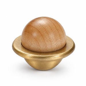 Light wood half-ball cabinet knob set in a brass cup, style #4.