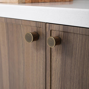 In-use view of dark wood barrel cabinet knob with coffee-finish end caps, style #7 Coffee.