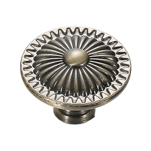 Antique bronze-tone round cabinet knob with a fluted flower face, option No. 3.