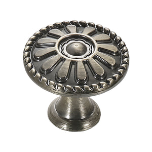 Antique bronze-tone round cabinet knob with raised petals, option No. 7, 24 mm.