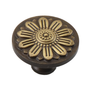 Antique bronze-tone round cabinet knob with a raised floral face, option No. 2.