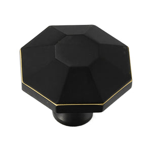 Black bronze multi-faceted cabinet knob with a small flat center, option No. 1.