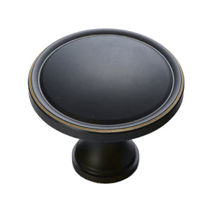 Black bronze round cabinet knob with a raised rim.