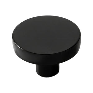 Black round cabinet knob with a flat top, 35 mm.