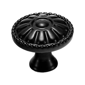 Black round cabinet knob with raised fluting and a beaded rim, option No. 2.