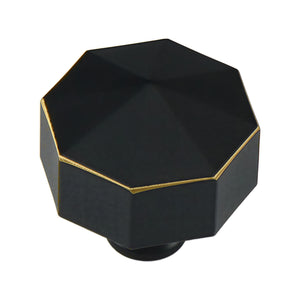 Black multifaceted geometric cabinet knob with gold-tone edges, option No. 5.