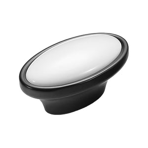 Black oval cabinet knob with a white ceramic top, option No. 2.