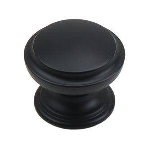 Black round mushroom cabinet knob with a stepped rim, option No. 1.