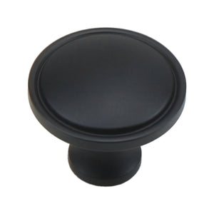 Black round cabinet knob with a recessed face and raised rim, option No. 2.