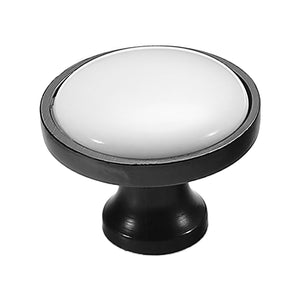 Black round cabinet knob with a white ceramic top, option No. 1.