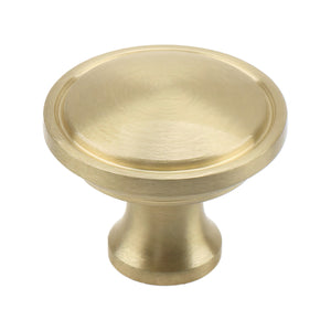 Brass-tone round cabinet knob with a shallow concave face, option No. 1.